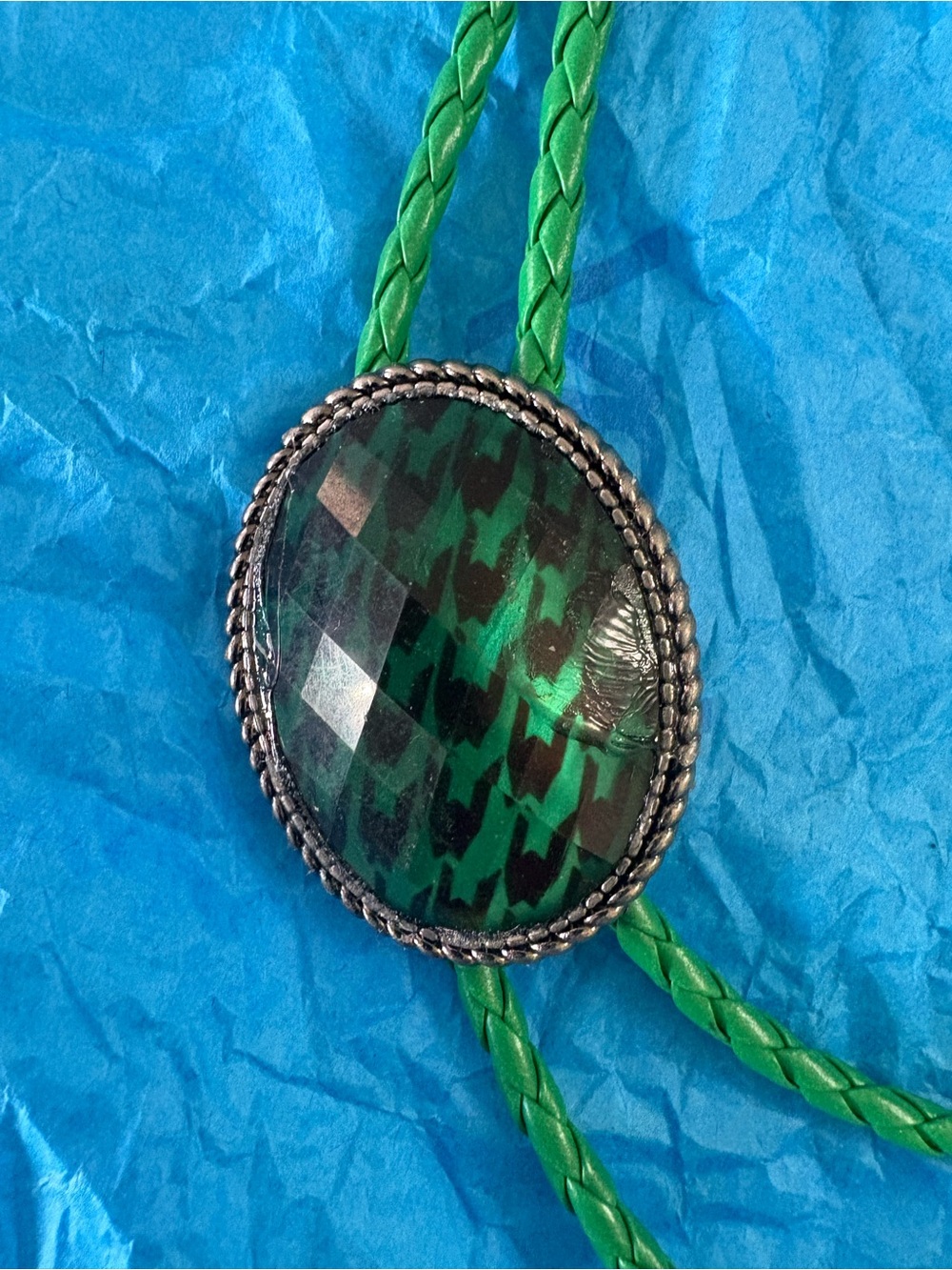 Green Braided Leather Bolo Tie with Patterned Stone Accent